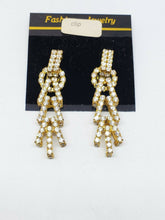 Gold Tone Crystal Rhinestone Studded Geometric Gold Tone Clip On Earrings