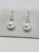 Sterling Silver Faux Pearl And Cubic Zirconia Stud Earrings